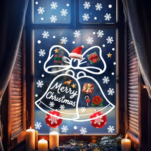 Cozy window display featuring Merry Christmas decals with stars and gingerbread man