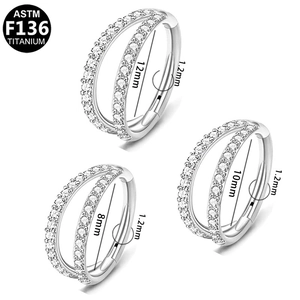 Macro shot of F136 titanium double cubic zirconia hinged rings in 8mm, 10mm and 12mm sizes