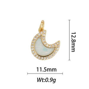 Detail view of gold crescent moon pendant with opal inlay and clear dimension markers