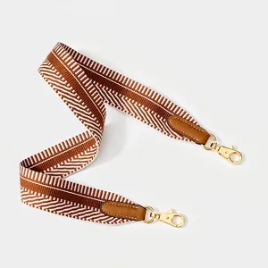 Classic wide woven replacement shoulder strap with brown V-pattern and gold metal hooks