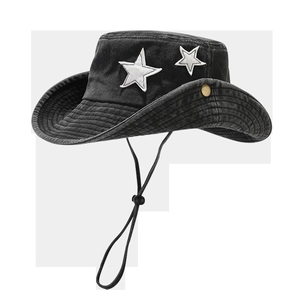 Close-up of black denim sun hat with white star embroidery and adjustable wind cord