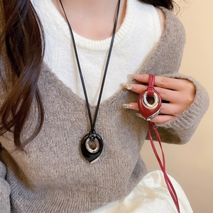 Minimalist leather cord necklace with teardrop enamel pendant in black and burgundy