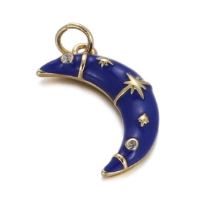 Close-up of a blue enamel moon pendant with gold star accents and small crystals