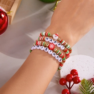 Detail of Christmas beaded bracelet set with Santa motifs and Happy Christmas lettering