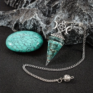 Detailed healing turquoise resin pendulum with spiral copper wire and celestial charms