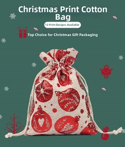 Detail of Christmas cotton drawstring bag with festive red tree and ball prints