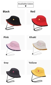 Detail of outdoor sun hats in six colors featuring heart embroidery and windproof ropes