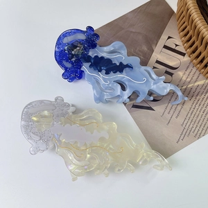Artistic jellyfish acetate hair claw clips with glittery finish and ocean design