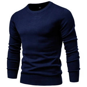 Close-up of deep blue crewneck knit sweater texture and internal size label detail