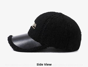 Side view of black fleece baseball cap with leather brim and gold embroidery detail