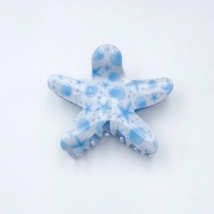 Starfish hair claw clip with blue marine pattern on white background for women