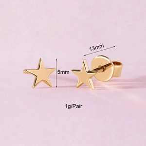 Macro view of gold star stud earrings showing 5mm diameter and 13mm pin measurements