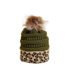 Detail of chunky olive knit beanie with large faux fur pom-pom and leopard print cuff