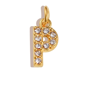 Detailed view of a gold-plated letter P pendant with sparkling cubic zirconia inlay