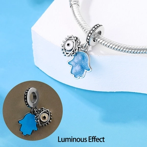 Silver DIY luminous Hamsa Hand and Evil Eye charm with blue glitter and night glow effect