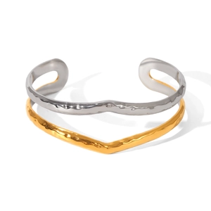 Two-tone gold and silver stainless steel open cuff bracelet with hammered wavy texture