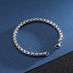 Sleek silver stainless steel box chain bracelet for men with a polished finish and lobster clasp
