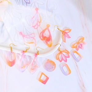 DIY geometric resin earring silicone molds with finished colorful glitter leaf shapes