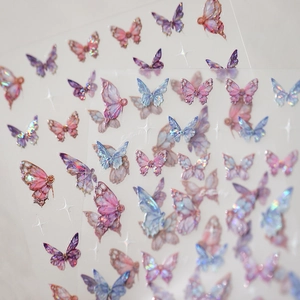 Laser holographic butterfly nail art stickers with frosted 3D effect in pink and blue