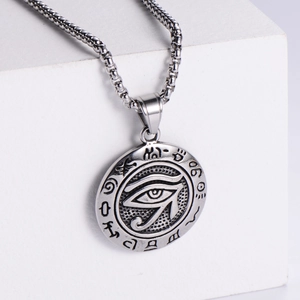 Silver stainless steel necklace with round Eye of Horus pendant on white background