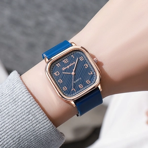 Elegant rose gold square quartz watch for women with blue dial and silicone strap