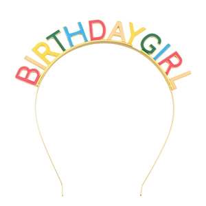 Close-up of golden headband with colorful enamel IT'S MY BIRTHDAY letters for girls