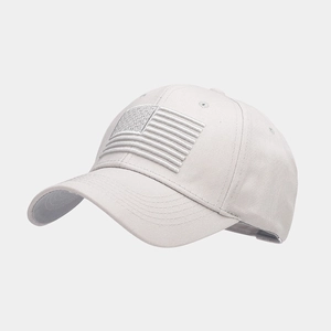 Close-up of light grey baseball cap featuring detailed tone-on-tone American flag embroidery