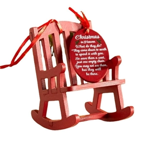 Red wooden Christmas rocking chair ornament with a heart-shaped poem tag on white background