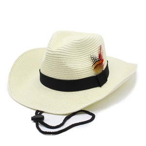 Detail of straw cowboy hat with black band, colorful feathers and adjustable chin cord