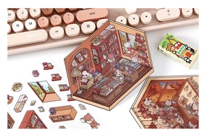 Close-up of 3D PET stickers showing bookstore and coffee shop scenes for DIY scrapbooking