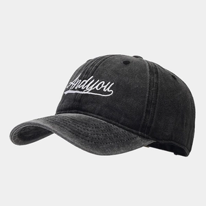 Vintage washed black denim baseball cap with Andyou embroidery shown from 45-degree angle