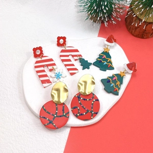 Handmade Christmas earrings featuring festive Santa, reindeer, and tree designs