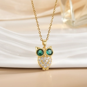 Classic vintage owl pendant necklace in gold with green zircon eyes and clear stones