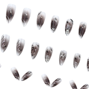 Black and white marble press-on nails with 3D silver butterflies and glitter details