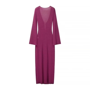 Detail view of fuchsia mesh knit beach cover-up with deep V-neck and flared sleeves