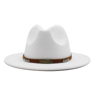 Close-up of white wool fedora with studded brown band and vintage metal buckle detail