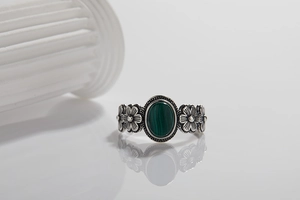 Retro S925 silver ring with oval malachite stone and flower design on white background