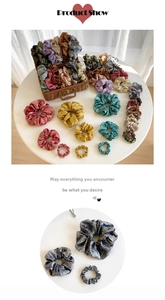Detail showing various sizes and colors of shiny French vintage pleated hair scrunchies