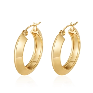 Detailed view of thick 18K gold plated geometric hoop earrings with polished mirror finish