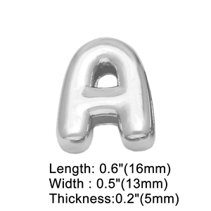 Macro detail of silver letter A charm for bracelets with dimensions 16x13x5mm