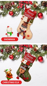 Detail view of 3D Christmas stockings with Snowman and Elk embroidery and Merry Christmas text