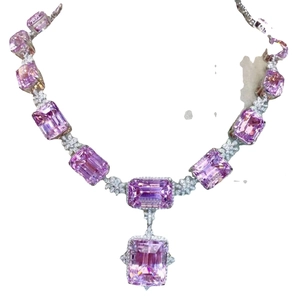 Luxury necklace set with pink rectangular gemstones and floral diamond accents