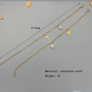 18K gold plated stainless steel bracelet with daisy, pearl and lightning bolt charms