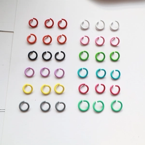 Set of 36 colorful painted metal jump rings in 12 vibrant colors for DIY jewelry making