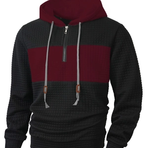 Men's quarter-zip hoodie in black and burgundy with a textured waffle-knit pattern