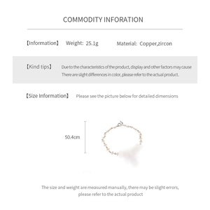 Detailed size chart for safety pin cross necklace showing weight, material and 50.4cm length