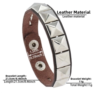 Close-up of punk brown leather bracelet with silver square studs and metal buckle details