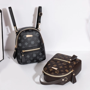Mini floral print backpack in black and brown PU leather with golden zippers