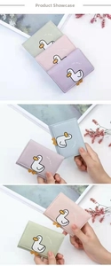 Vertical collage of pastel mini wallets with cute duck illustrations and luck duck text