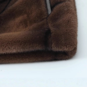 Short brown faux fur skirt with thick soft texture and premium glossy synthetic finish